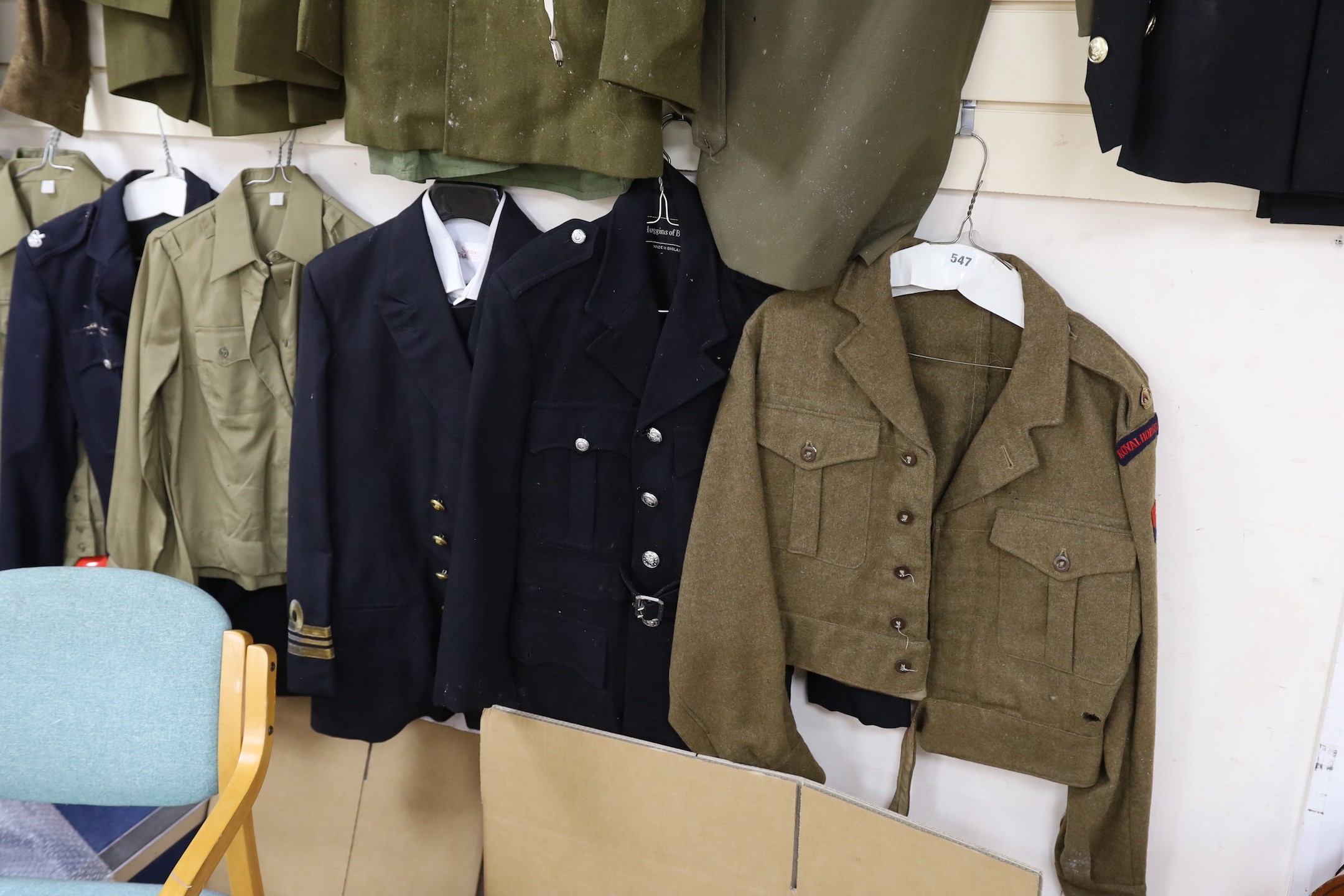 A collection of mixed Royal Navy and army military uniforms, including Royal Australian Corps of Signals (woman’s), Royal Artillery, Russian Army etc.